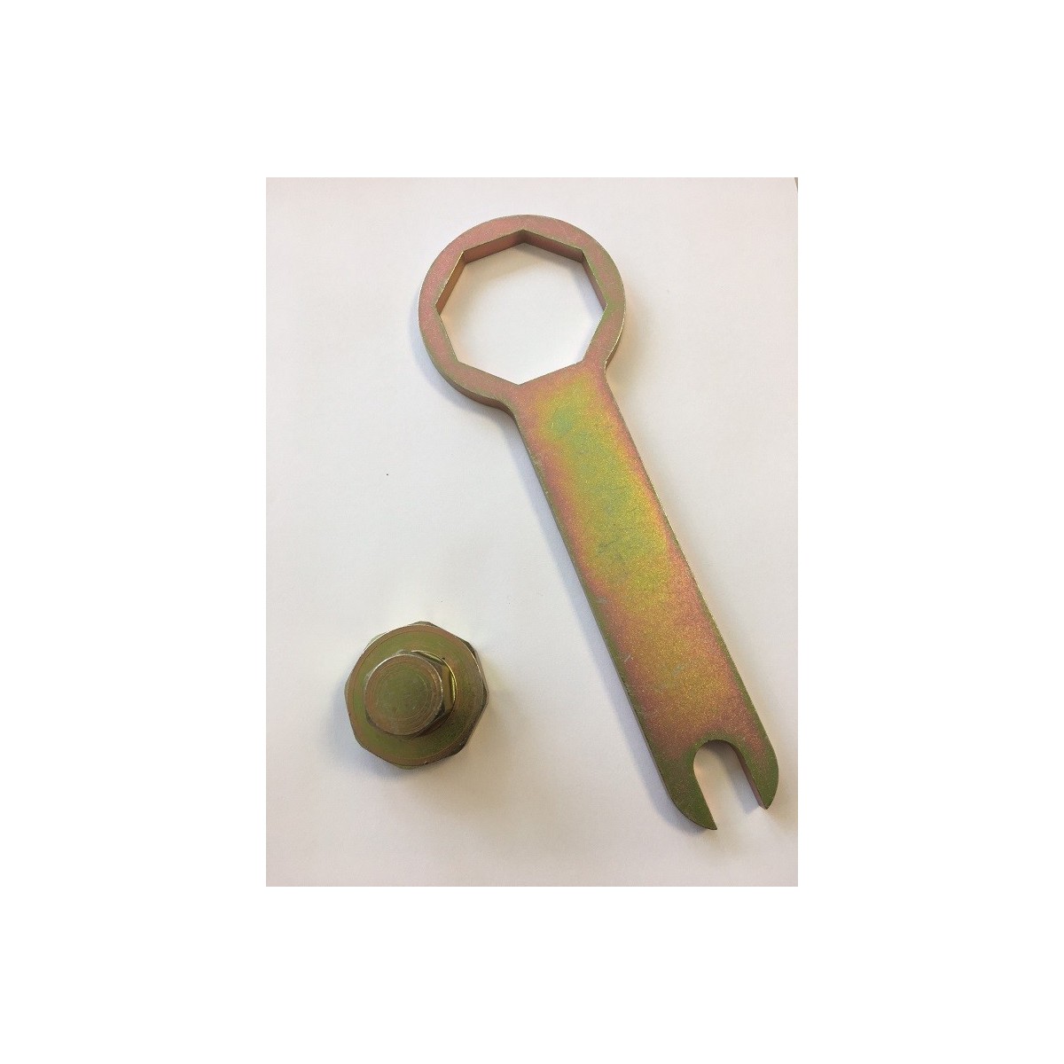 Clé de démontage du bouchon de compression 